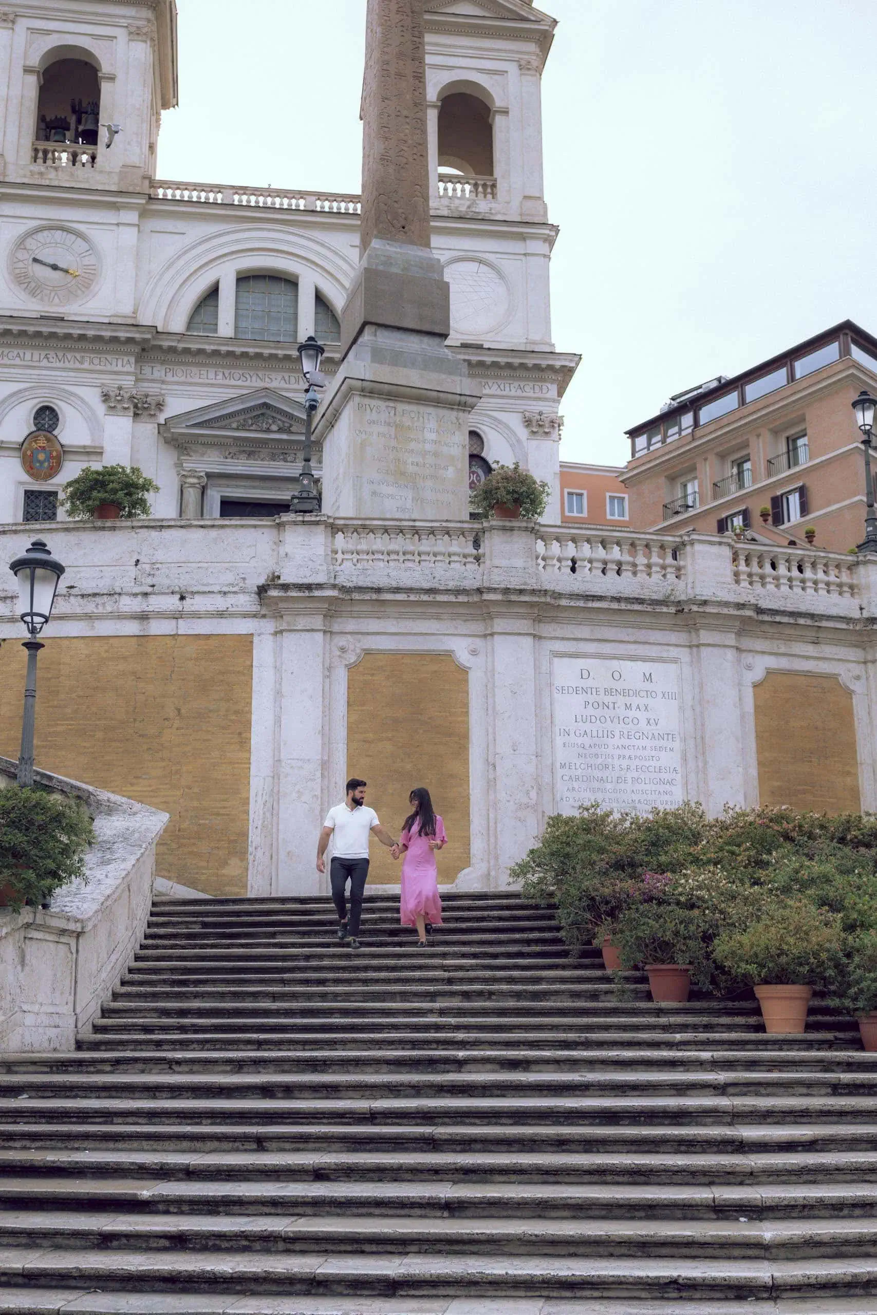 Couple descending spanish steps trinita dei monti - Rome by Finzi