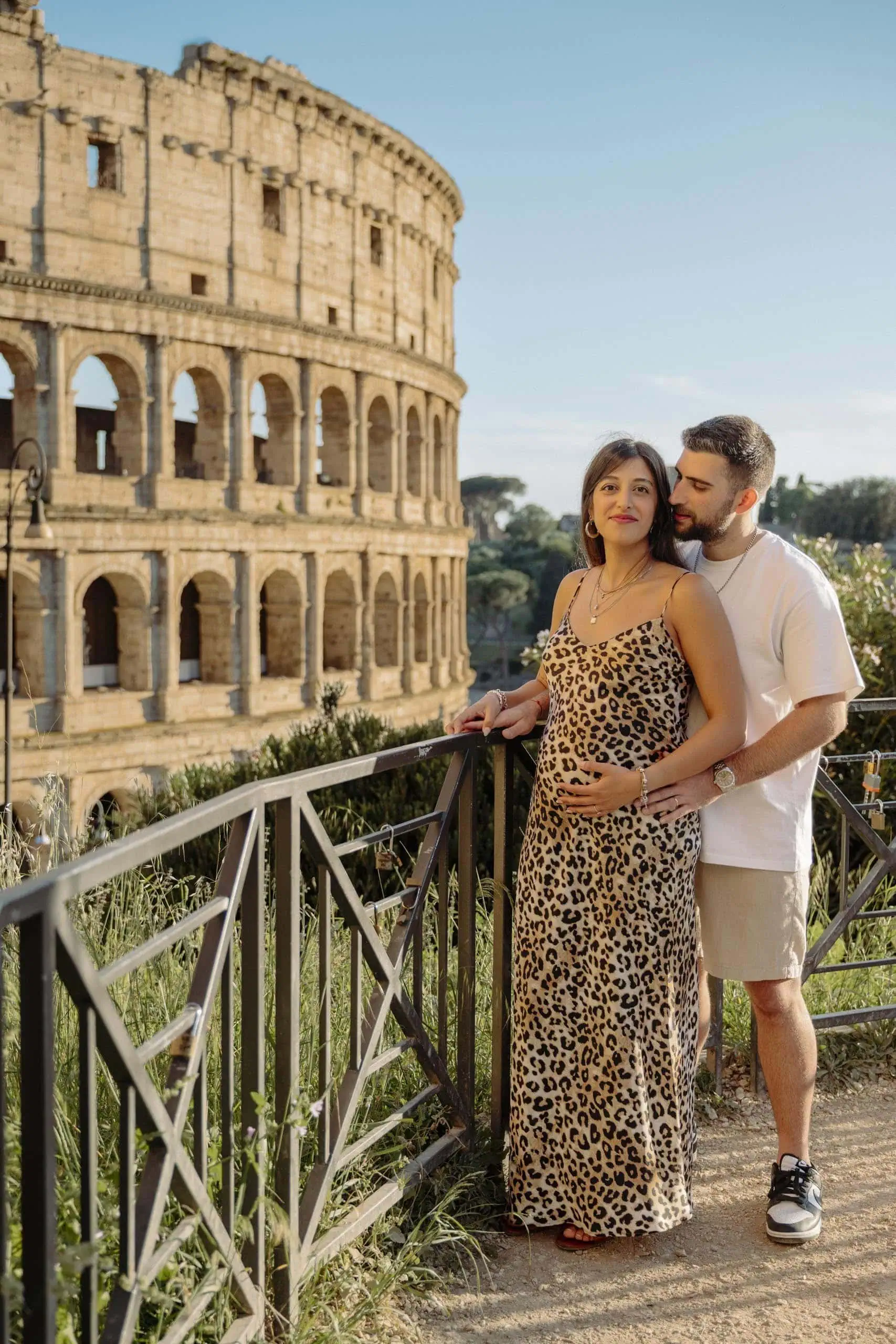 Couple embracing railing colosseum Rome - Rome by Finzi
