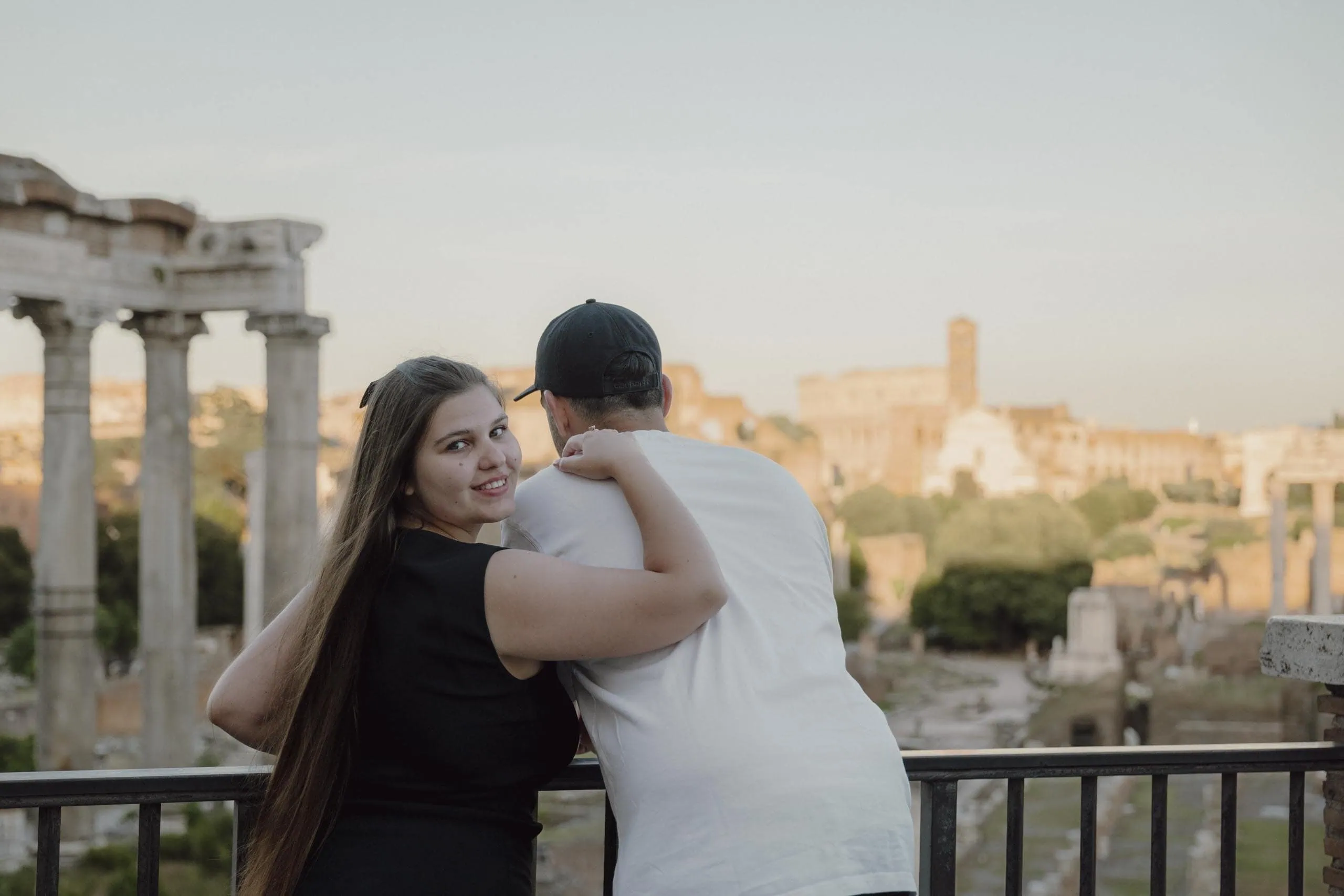 Couple embracing railing roman forum - Rome by Finzi