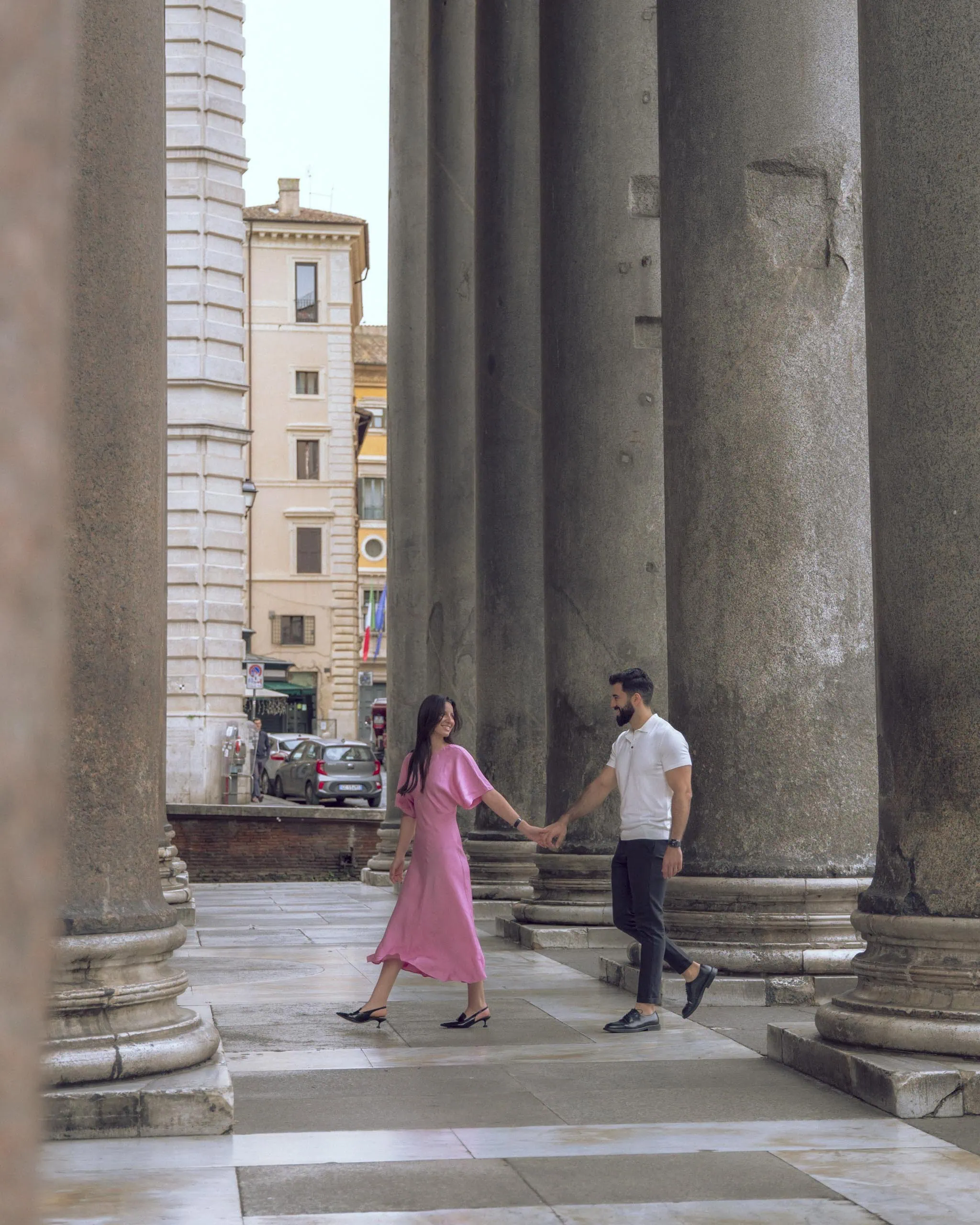 Couple holding hands pantheon colonnade Rome - Rome by Finzi