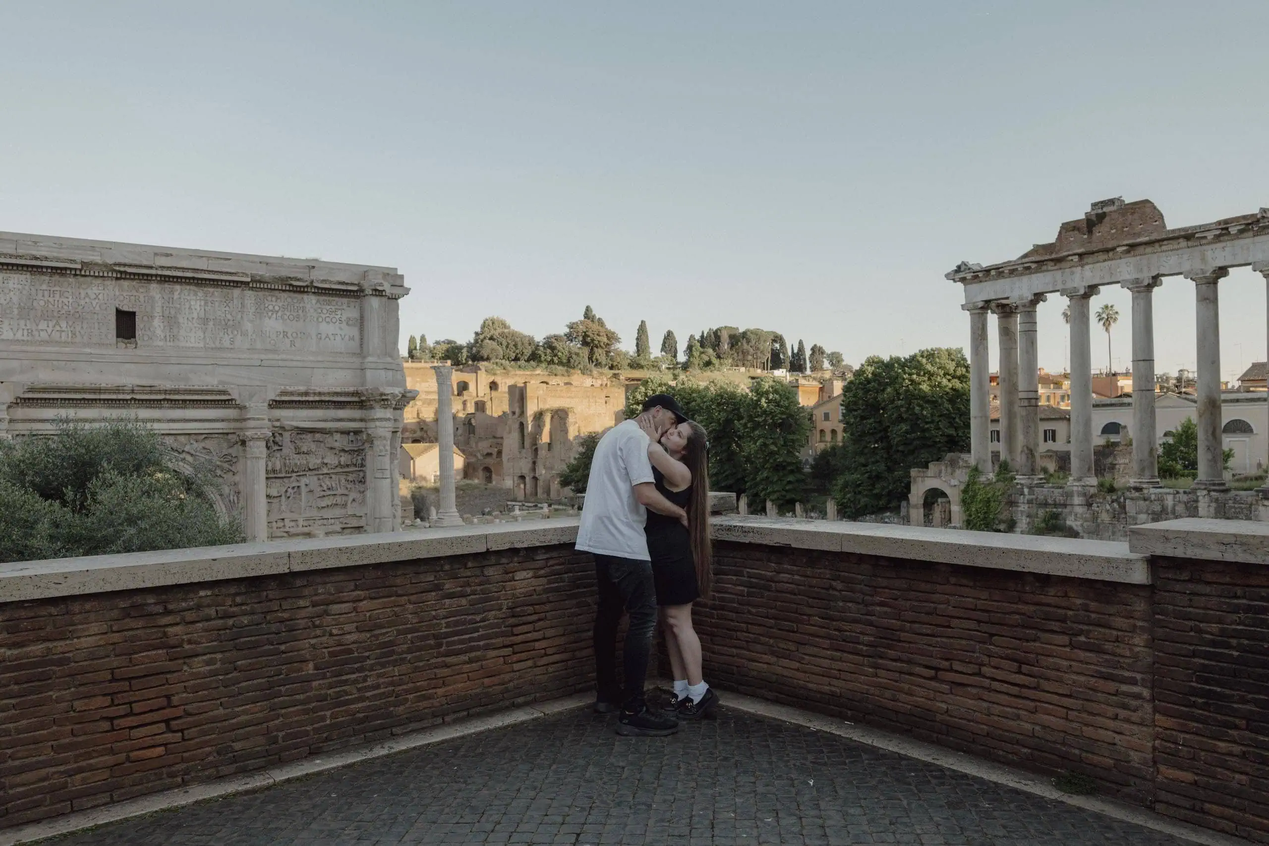 Couple kissing temple columns roman forum Rome - Rome by Finzi