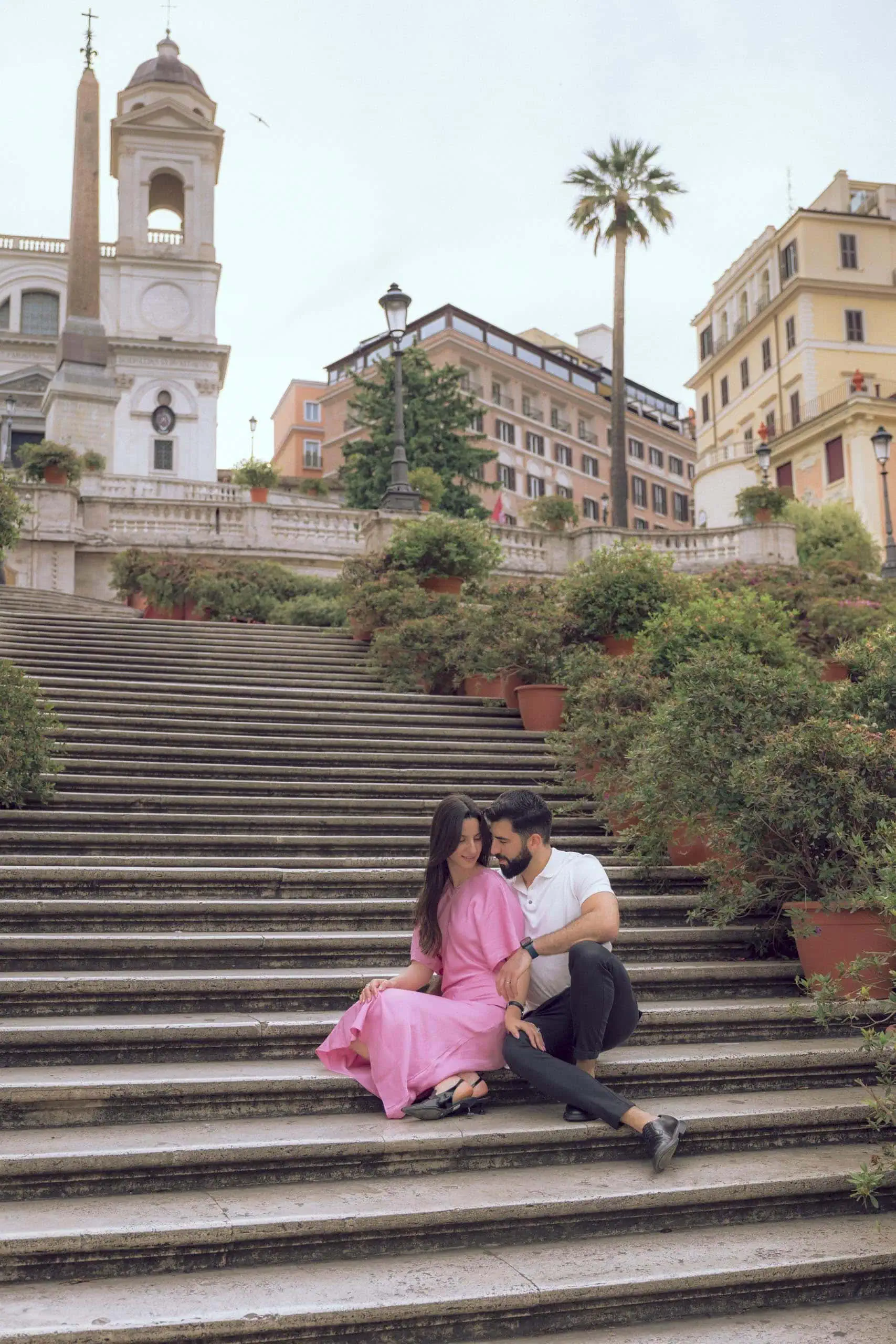 Couple seated spanish steps palm tree Rome - Rome by Finzi