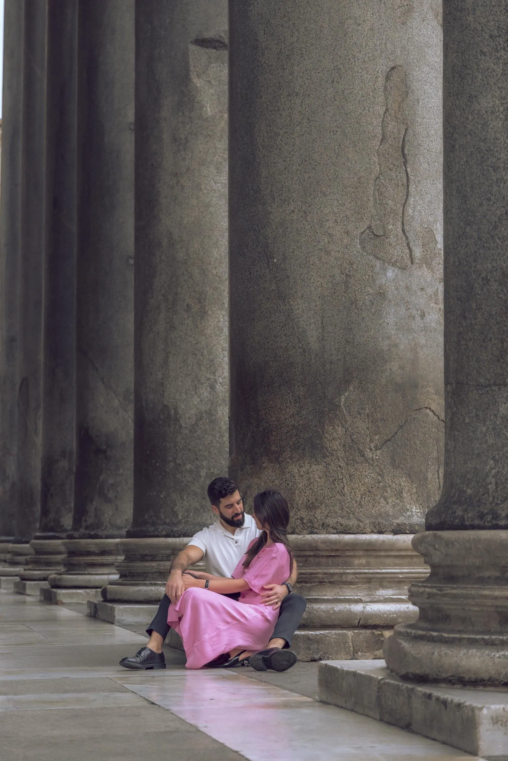 Couple sitting embrace pantheon columns Rome - Rome by Finzi
