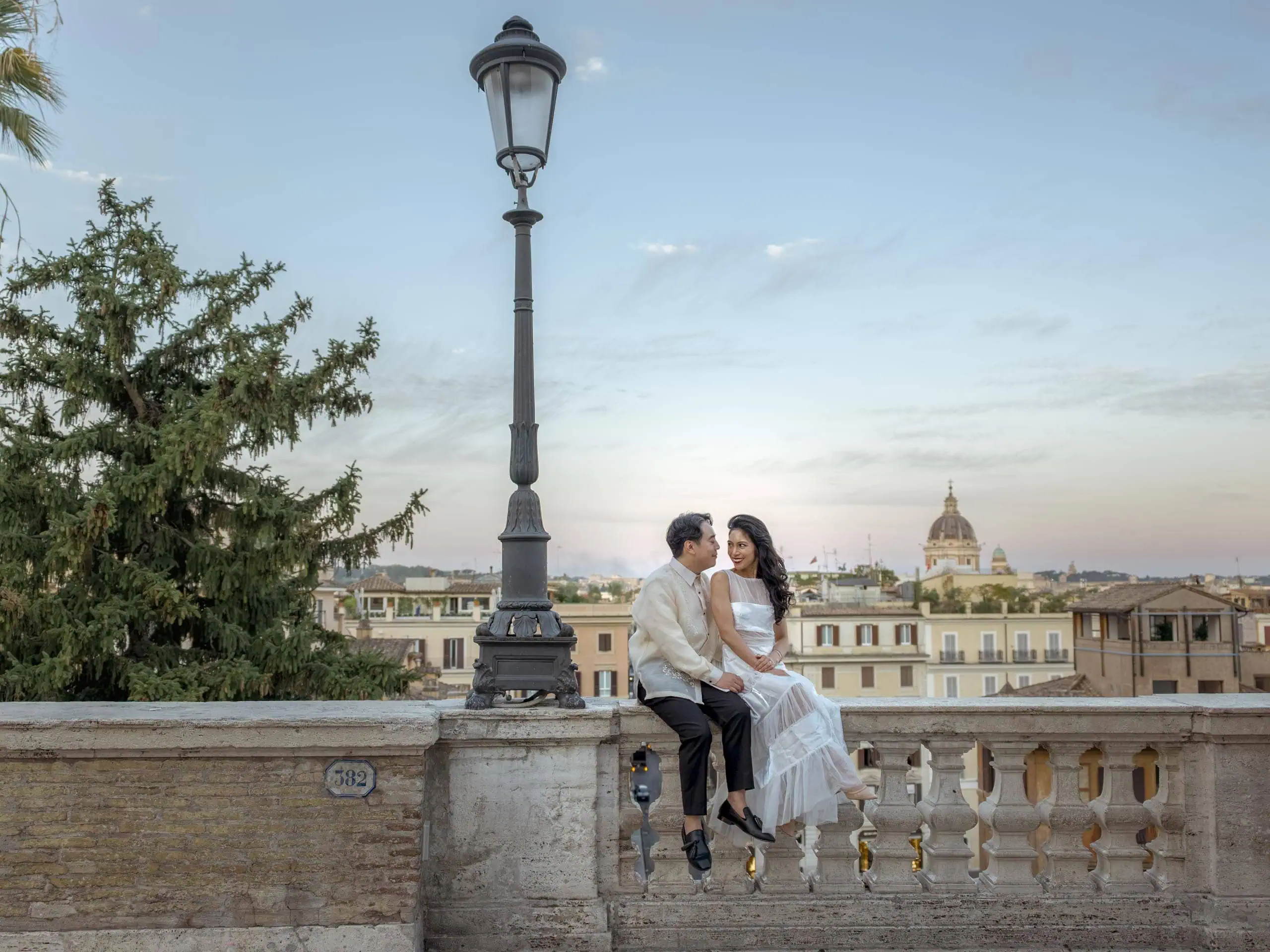 Couple balustrade Rome skyline dusk - Rome by Finzi